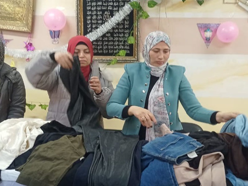 A charity clothing exhibition in university dormitories for female students as part of the “Dokkan Al-Farha” initiative for free