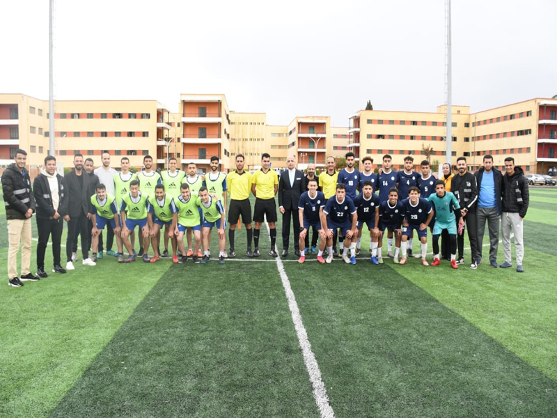 Prof. Mohamed Diaa Zain Al-Abedeen kicks the kickoff during the opening of the “University President’s Cup” activities