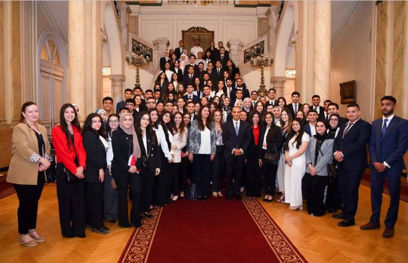 Students of the Faculty of Arts participate in an interactive meeting held by the Minister of Foreign Affairs and Immigration with 100 students from Egyptian universities