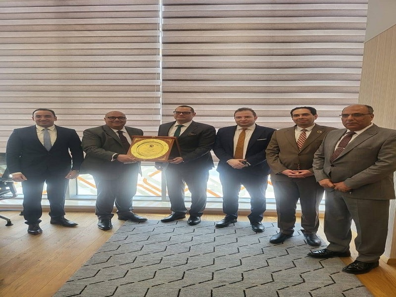 The Faculty of Law presents its Diamond Jubilee Shield to Counselor Sherif Mohamed Kamal El-Shazly, Vice President of the State Council and Head of the Cabinet's Advisory Board